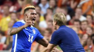 Zardes (left), hugs Head Coach Jurgen Klinsmann (right), scored his first international goal against the Netherlands, as did Bobby Wood and Danny Williams. 