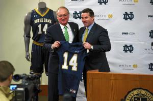 Under Armour CEO Kevin Plank (right) announces the deal worth $90 million over the span of 10 years with University of Notre Dame with the school's athletics director, Jack Swarbrick. 